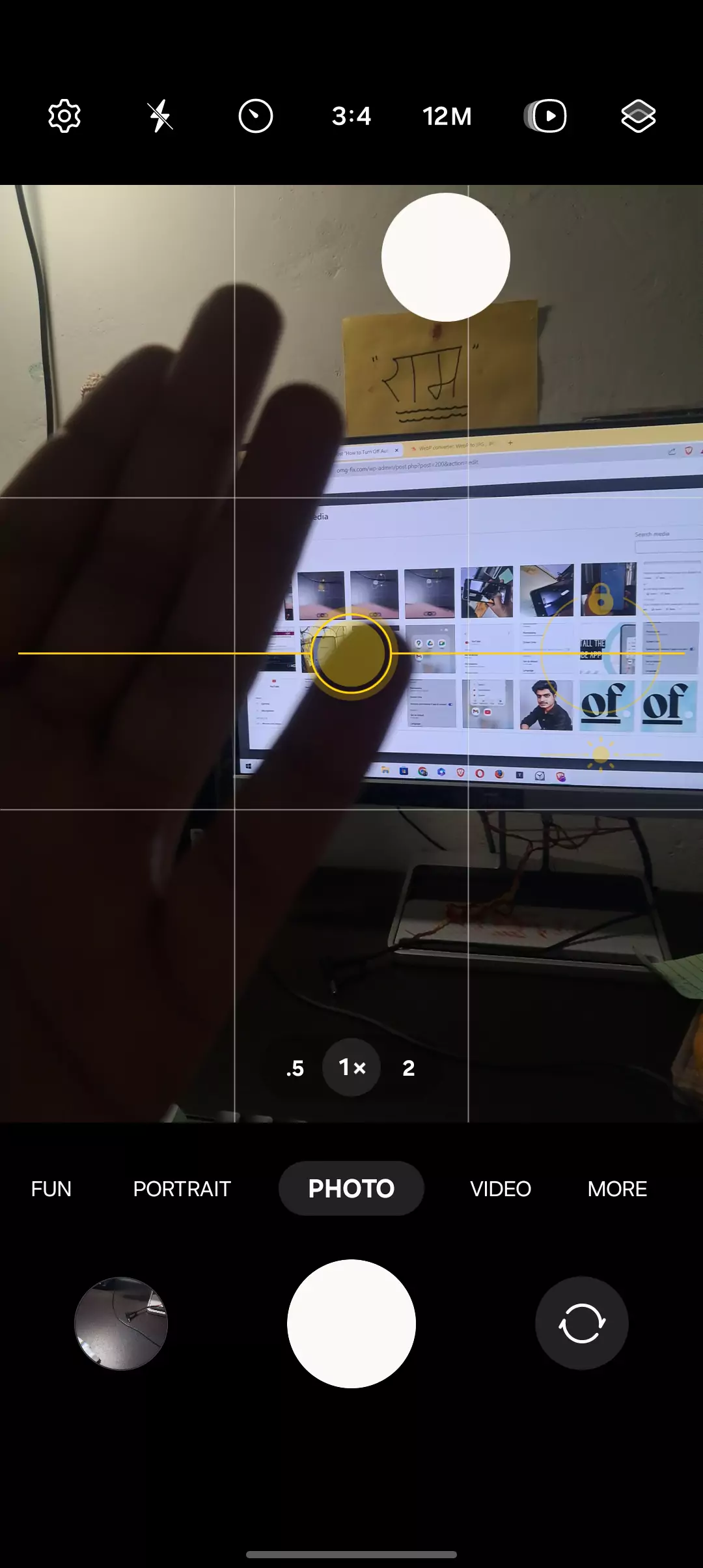 screenshot of me showing my hand in the camera in the camera app with focus locked